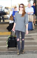 ASHLEY GREENE Arrives at LAX Airport in Los Angeles