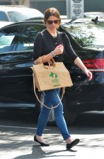 ASHLEY GREENE Leaves a Pet Clinic in Los Angeles