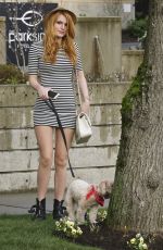 BELLA THORNE Walks Her Dog Out in Los Angeles