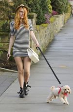 BELLA THORNE Walks Her Dog Out in Los Angeles