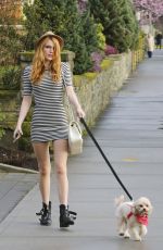 BELLA THORNE Walks Her Dog Out in Los Angeles