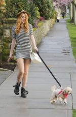 BELLA THORNE Walks Her Dog Out in Los Angeles