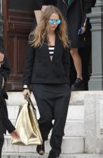CARA DELEVINGNE Leaves Stella Mccartney Fashion Show