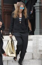 CARA DELEVINGNE Leaves Stella Mccartney Fashion Show