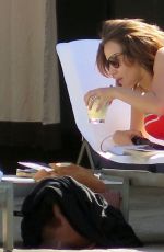 CAROLINE FLACK in Bikini at a Hotel Pool in Los Angeles