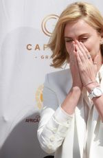 CHARLIZE THERON at Formula 1 Rolex Australian Grand Prix