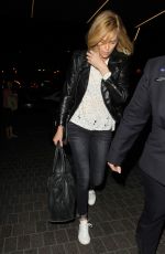 CHARLIZE THERON at LAX Airport in Los Angeles 1303