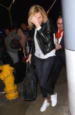 CHARLIZE THERON at LAX Airport in Los Angeles 1303