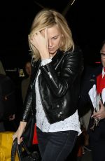 CHARLIZE THERON at LAX Airport in Los Angeles 1303