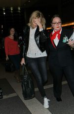 CHARLIZE THERON at LAX Airport in Los Angeles 1303