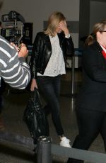 CHARLIZE THERON at LAX Airport in Los Angeles 1303