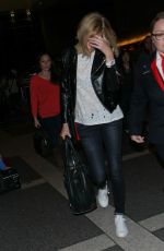 CHARLIZE THERON at LAX Airport in Los Angeles 1303