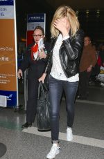 CHARLIZE THERON at LAX Airport in Los Angeles 1303