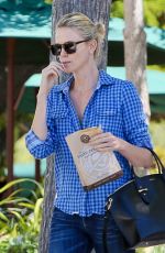 CHARLIZE THERON in Jeans Out and About in Malibu