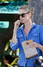 CHARLIZE THERON in Jeans Out and About in Malibu