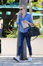 CHARLIZE THERON in Jeans Out and About in Malibu