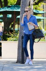 CHARLIZE THERON in Jeans Out and About in Malibu