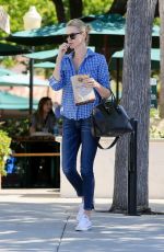 CHARLIZE THERON in Jeans Out and About in Malibu