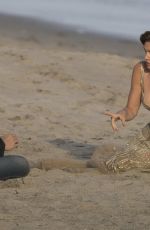 CINDY CRAWFORD on the Set of a Photoshoot in Malibu