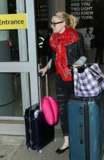 DAKOTA FANNING Arrives at JFK Airport in New York 2203