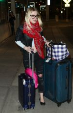 DAKOTA FANNING Arrives at JFK Airport in New York 2203