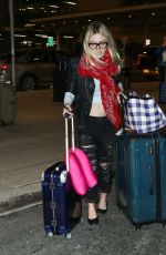 DAKOTA FANNING Arrives at JFK Airport in New York 2203