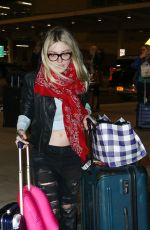 DAKOTA FANNING Arrives at JFK Airport in New York 2203