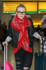 DAKOTA FANNING Arrives at JFK Airport in New York 2203