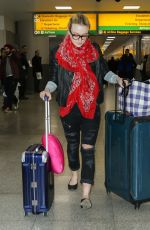 DAKOTA FANNING Arrives at JFK Airport in New York 2203