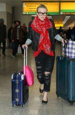 DAKOTA FANNING Arrives at JFK Airport in New York 2203