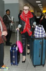 DAKOTA FANNING Arrives at JFK Airport in New York 2203