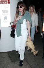 DAKOTA JOHNSON Arrives at Los Angeles International Airport 2103