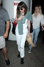 DAKOTA JOHNSON Arrives at Los Angeles International Airport 2103