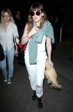 DAKOTA JOHNSON Arrives at Los Angeles International Airport 2103