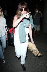 DAKOTA JOHNSON Arrives at Los Angeles International Airport 2103