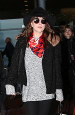 DAKOTA JOHNSON at Charles De Gaulle Airport in France