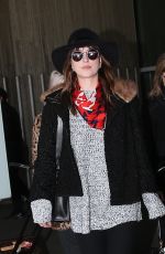 DAKOTA JOHNSON at Charles De Gaulle Airport in France