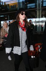 DAKOTA JOHNSON at Charles De Gaulle Airport in France
