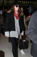 DAKOTA JOHNSON at Charles De Gaulle Airport in France