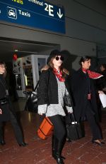 DAKOTA JOHNSON at Charles De Gaulle Airport in France