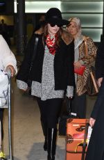 DAKOTA JOHNSON at Charles De Gaulle Airport in France