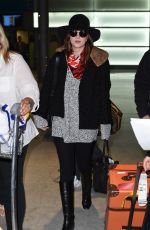 DAKOTA JOHNSON at Charles De Gaulle Airport in France