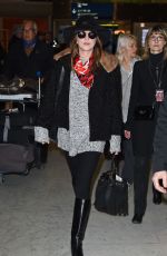 DAKOTA JOHNSON at Charles De Gaulle Airport in France