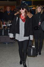 DAKOTA JOHNSON at Charles De Gaulle Airport in France