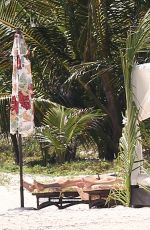 DAKOTA JOHNSON in Bikinia at a Beach in Cancun