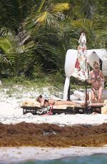 DAKOTA JOHNSON in Bikinia at a Beach in Cancun