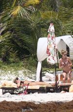 DAKOTA JOHNSON in Bikinia at a Beach in Cancun