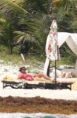 DAKOTA JOHNSON in Bikinia at a Beach in Cancun