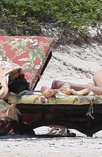 DAKOTA JOHNSON in Bikinia at a Beach in Cancun