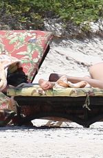 DAKOTA JOHNSON in Bikinia at a Beach in Cancun